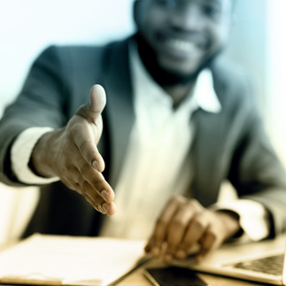 Photo of person holding out hand Photo of person holding out hand