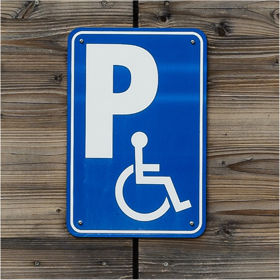 Parking sign with wheelchair symbol Parking sign with wheelchair symbol