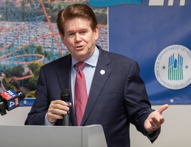 [Arlington Mayor Jeff Williams speaks at the dedication of the Arlington EnVision Center on Feb. 27 at the Arlington Human Service Center. The EnVision Center is the fourth in the state of Texas.]