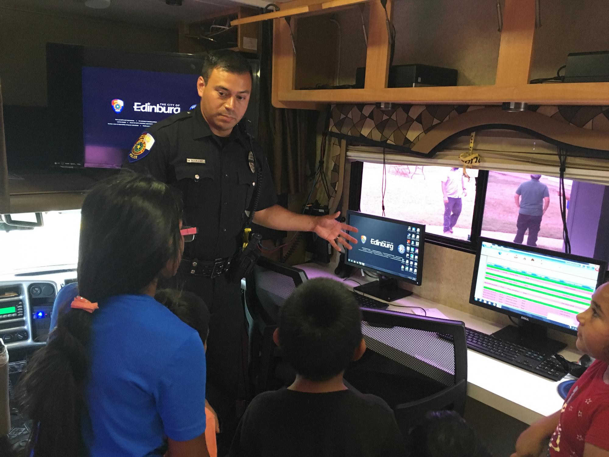 Police Officer teaches the importance of safety, Edinburg, TX.. HUD Photo