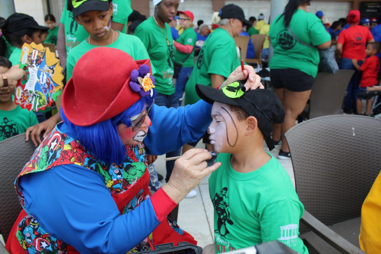 Participant Enjoys Face Painting during Puerto Rico's Event. HUD Photo