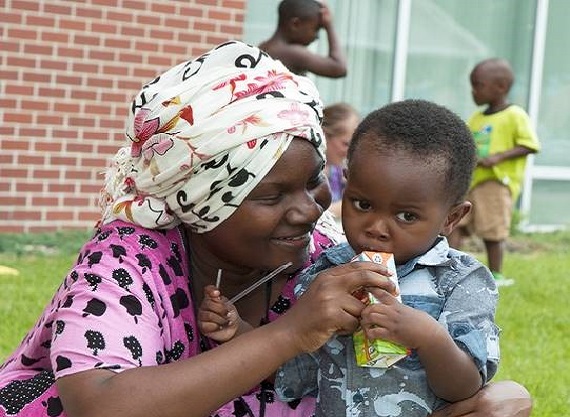 Mother and son enjoy Field Day with Fathers. HUD Photo