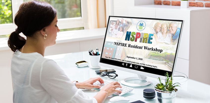 A woman views the title screen of the NSPIRE Resident virtual workshop presentation.