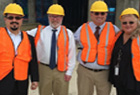 David Vargas, Chairman of the Pasco County Board of Commissioners David Lambert, and two REAC inspectors at Hudson Hills Manor development.