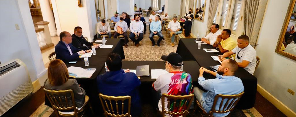 [Efrain Maldonado, HUD San Juan Field Office Director addresses the signatories of ConSur, a municipal consortium with Puerto Rico’s Department of Housing, to use CDBG-DR funds for the recovery of six municipalities severely affected by earthquakes of late 2019 and early 2020]. 