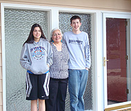 A Native American family at their new home